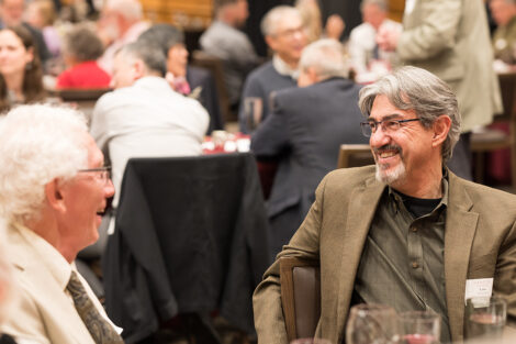 Faculty members talk to each other at the Faculty Staff Awards