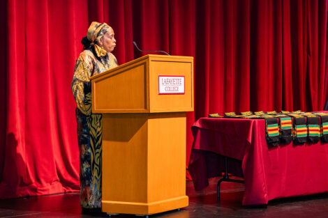 A speaker at the Donning of the Kente