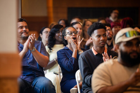 The crowd cheers during Posse celebration