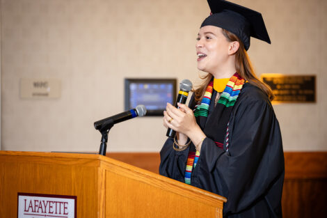 A person speaks at Posse celebration