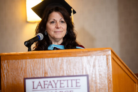 A person speaks at Posse celebration