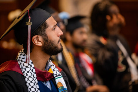 A student listens during the Posse celebration