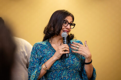 A person speaks at Posse celebration