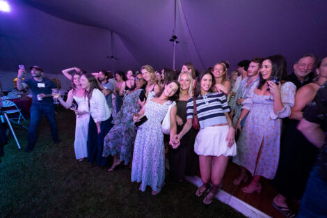 Alumni are dancing under the Reunion tent