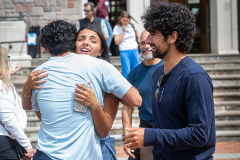 Family members hug during Lafayette College's move in weekend.
