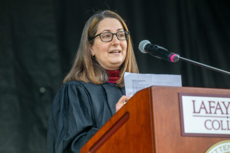 Kristin Chisesi '99, chair of the North East Alumni Council, speaks during Lafayette College's Convocation on Thurs., Aug. 21.