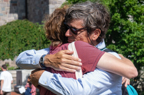 Family members hug during Lafayette College's move in weekend.