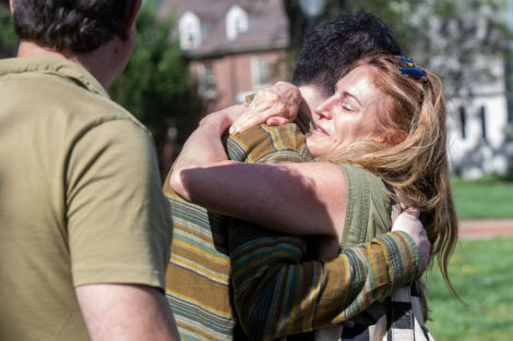 Family members hug during Lafayette College's move in weekend.