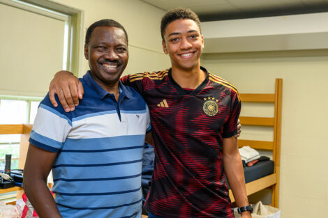 An incoming student in Lafayette College's Class of 2025 smiles with a family member