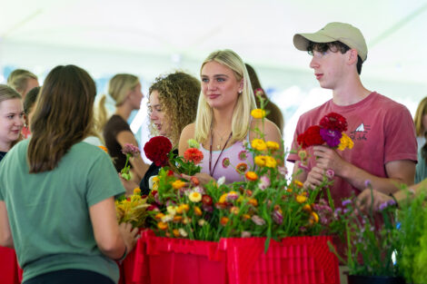 Students make their own flower arrangements.