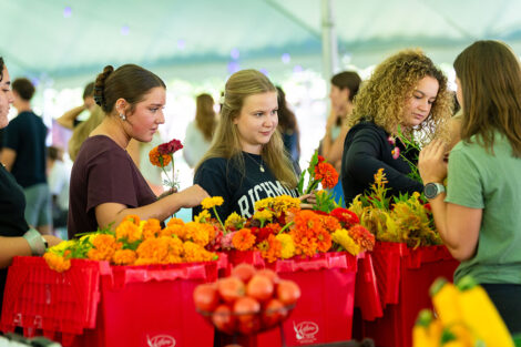 Students make their own flower arrangements.