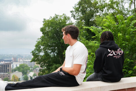 Two students in Bicentennial Abercrombie & Fitch clothing, overlook downtown Easton.