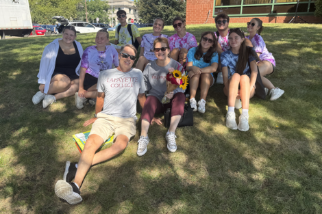 President Nicole Hurd and Bill Hurd with students at the Easton Famers' Market