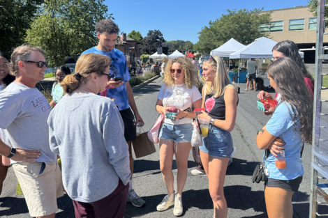 President Nicole Hurd speaks to students at the Easton Farmers' Market.