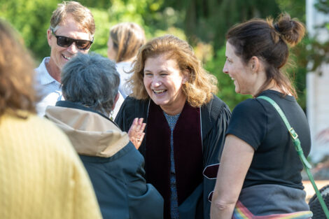 President Nicole Hurd speaks to a family at the Family and Friends Reception at the President's House.