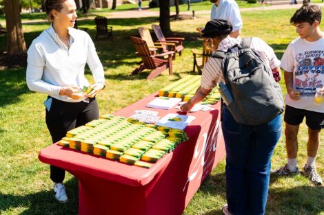 Lafayette community members getting Bicentennial Crayola crayons at the 2025 Marquis de Lafayette birthday celebration