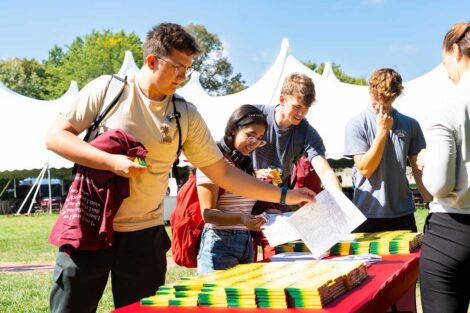 Lafayette community members getting Bicentennial Crayola crayons at the 2025 Marquis de Lafayette birthday celebration