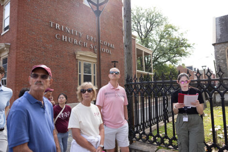 Lafayette College community members on tour in front of Trinity Episcopal Church School