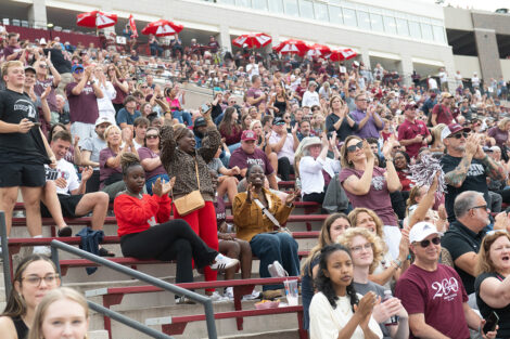 A crowd fills the bleachers at Fisher Stadium.