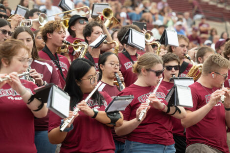 Members of the Lafayette College band play instruments.