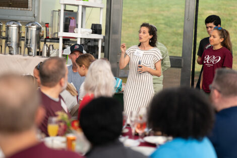 Delicia Nahman, sustainability director, speaks to attendees during the LaFarm to Table breakfast.