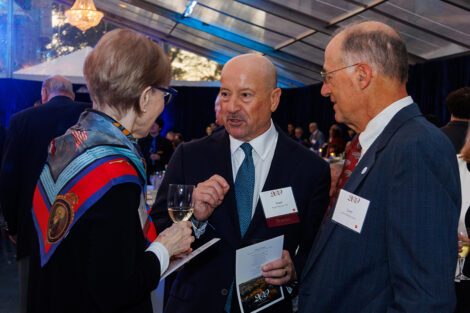 From left: Trustees Laneta Dorflinger '75 and Angel Mendez '82 speak with Lawrence Malinconico, associate professor of geology/geophysics. The three are in deep conversation.
