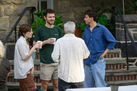 Students, alumni, and Lafayette College community members gather with coffee at McKelvy House.