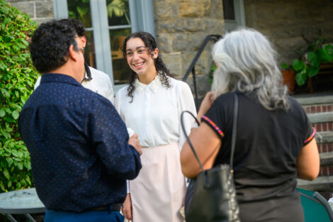 Students, alumni, and Lafayette College community members gather with coffee at McKelvy House.