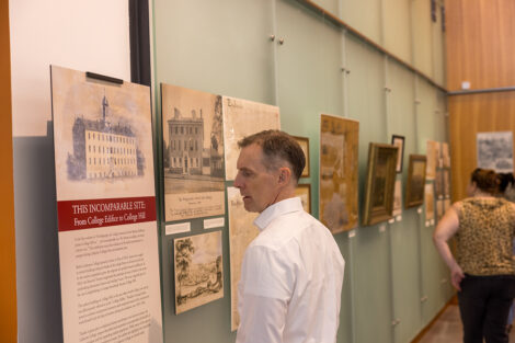 Lafayette community members observe artifacts of buildings at Lafayette College.