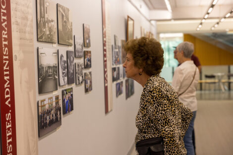 Lafayette community members observe artifacts of people at Lafayette College.
