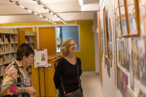 Lafayette community members observe artifacts of people at Lafayette College.
