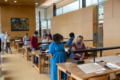 Lafayette community members observe artifacts of historical significance.