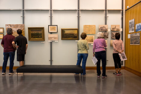 Lafayette community members observe artifacts of campus buildings.