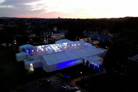 Sunset aerial view of the tent on March Field where the Marquis Founders Dinner and Bicentennial Kickoff took place.