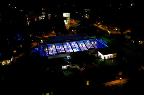 Evening aerial view of the tent on March Field where the Marquis Founders Dinner took place.