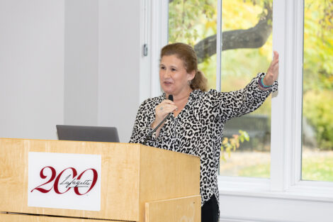 President Nicole Hurd speaks at a podium
