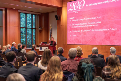 President Nicole Hurd speaks at a podium.
