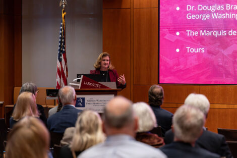 President Nicole Hurd speaks at a podium.