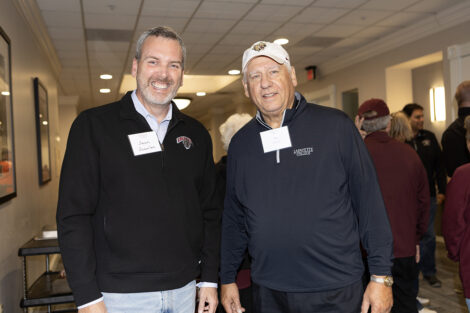 Sean Scanlon and an alum smile