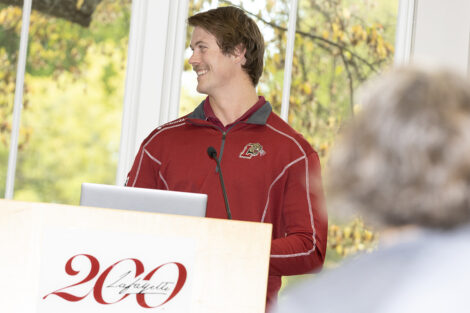 Tyler Roberts talks on stage