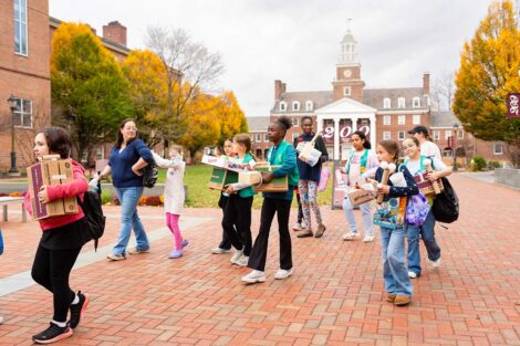 Girl Scouts walking outside Watson Hall on Lafayette campus