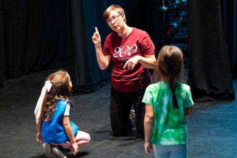 Girl Scouts learning about performing arts during badge session at Williams Arts Center