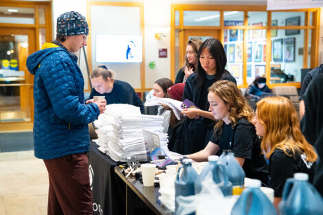 Students sign up for an event.