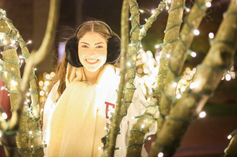 Students enjoy the lighting of the Quad.