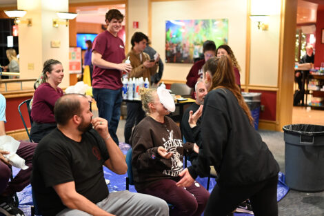 A student pies a staff member.