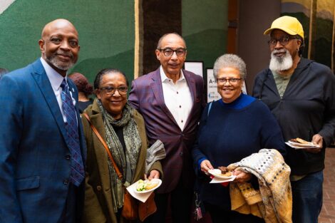 People pose at the Language of Sight reception
