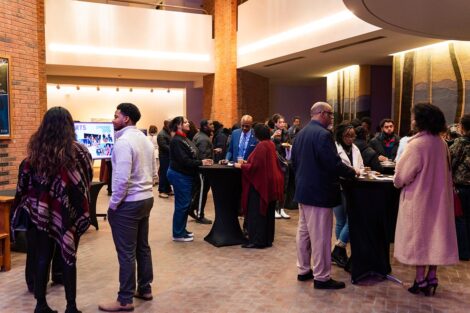 People gather in the lobby of Williams