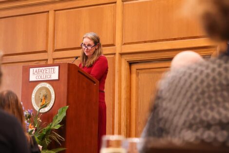 Susan Fox gives the keynote address at the podium