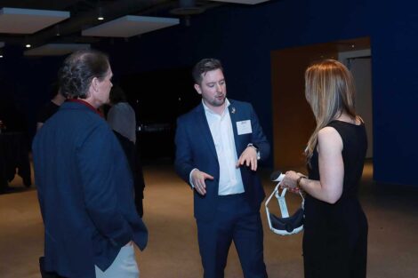 Guests at the Bicentennial Lafayette Legacies Event at Academy Museum of Motion Pictures in Los Angeles discussing VR headset with Prof. Eric Hupe