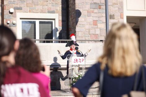 Marquis impersonator gives a speech outside Farinon